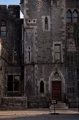 View of Ashford Castle with pavement and garden, Ireland, UK