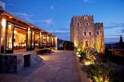 View of illuminated restaurant Ada Sofra, Bodrum, Ortakent, Turkey