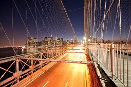 View of Brooklyn bridge at night, New York, USA