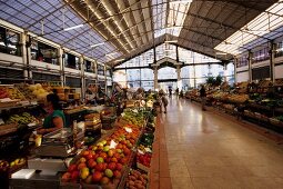 People walking in market hall of Lisbon