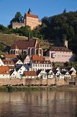 View of houses beside Neckar river in Hirschhorn, Germany