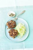 Berlin-style meat patties with white cabbage salad