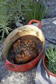 Close-up of braised pork in cooking pot