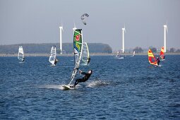 People surfing in Baltic sea in Schleswig-Holstein, Germany