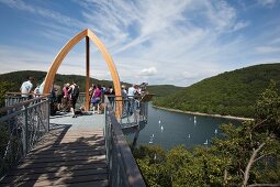 Tourists on Tree Top Walk bridge at Lake Eder, Hemfurth-Edersee, Hesse, Germany