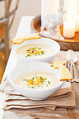 Parsnip soup with pear, croutons and parmesan shooting stars