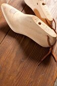 Wooden clogs as tools of shoemaker
