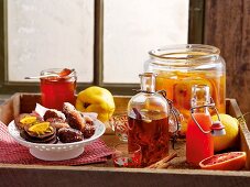 Winter cuisine: quince jelly, dates, chocolate biscuits and various different liqueurs