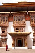 Monks in courtyard of Punakha monastery, Bhutan