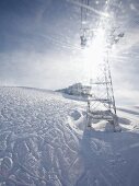 View of ski life tower in sunlight, Titlis, Alps, Engelberg, Obwalden, Switzerland