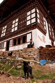 Man sitting at old Drukgyal Dzong in Paro, Bhutan