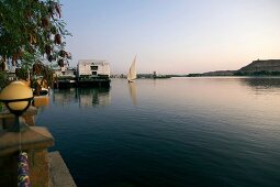 View of river and terrace of Aswan Hotel, Aswan, Egypt