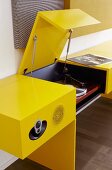 Yellow side table with music system