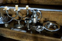 Tin, pewter, candle stand and pitcher plate made of tin