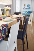 Set dining table and chairs of various colours
