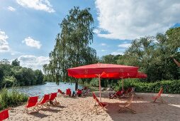 People relaxing on beach at Weddige bank 29 in Linden, Hannover, Germany