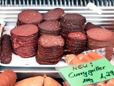 Slices of horse salami sausages at Pferdemetzgerei Worle Kaspar in Munich, Germany