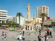 People at Konak Square in front of Izmir Clock Tower in Aegean Region, Turkey