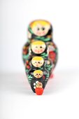 Colourful Russian dolls on white background