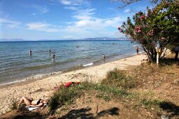 People at Icmeler beach in Dilek Peninsula National Park, Turkey