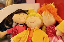 Colourful rag dolls in toy shop