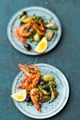 Spicy prawns with an artichoke and potato salad