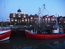 Boats at harbour in Neuharlingersiel, Lower Saxony, Germany