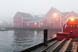 Fog in morning light at Lunenburg Harbour, Nova Scotia, Canada