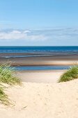 View of beach at Burnham Overy Staithe, England