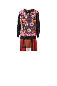 Floral patterned sweater on dress with graphic pattern on white background