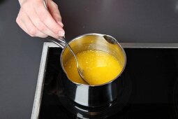 Melted butter in saucepan