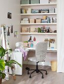 A shelf with a pull-out table separated by a curtain