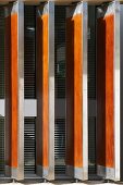 Revolving wooden shutter in metal frames