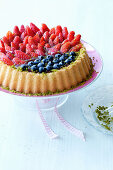 A berry cake with pistachios for Easter
