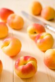 Fresh apricots on a wooden board