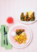 Lamb chops with a herb coating and potato salad (seen from above)