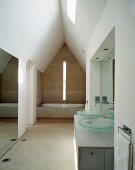 Sanctified ambience in modern bathroom in converted attic