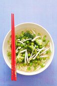 Noodle soup with broccoli, green beans, peas and bean sprouts (Asia)