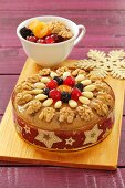 A fruitcake with almonds and walnuts