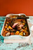 Lamb noisettes with pumpkin, potatoes and onions