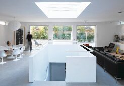 Generous living room with stairs leading downwards