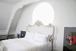 Bedroom with nostalgic double bed & portraits