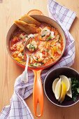 A fish stew with fennel, pepper and rice