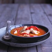 Wintry tomato and coconut soup with chicken