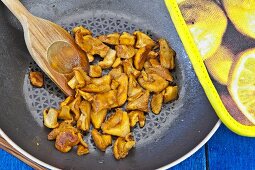 Fried chanterelle mushrooms in a pan