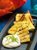 Grilled pineapple with rum, cinnamon and lime yogurt (Caribbean)