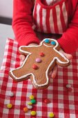 A child showing a gingerbread man