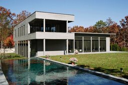 Modern villa with swimming pool in garden