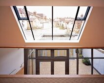 View of surrounding houses through skylight