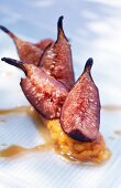 Baked figs on saffron risotto with caramel sauce